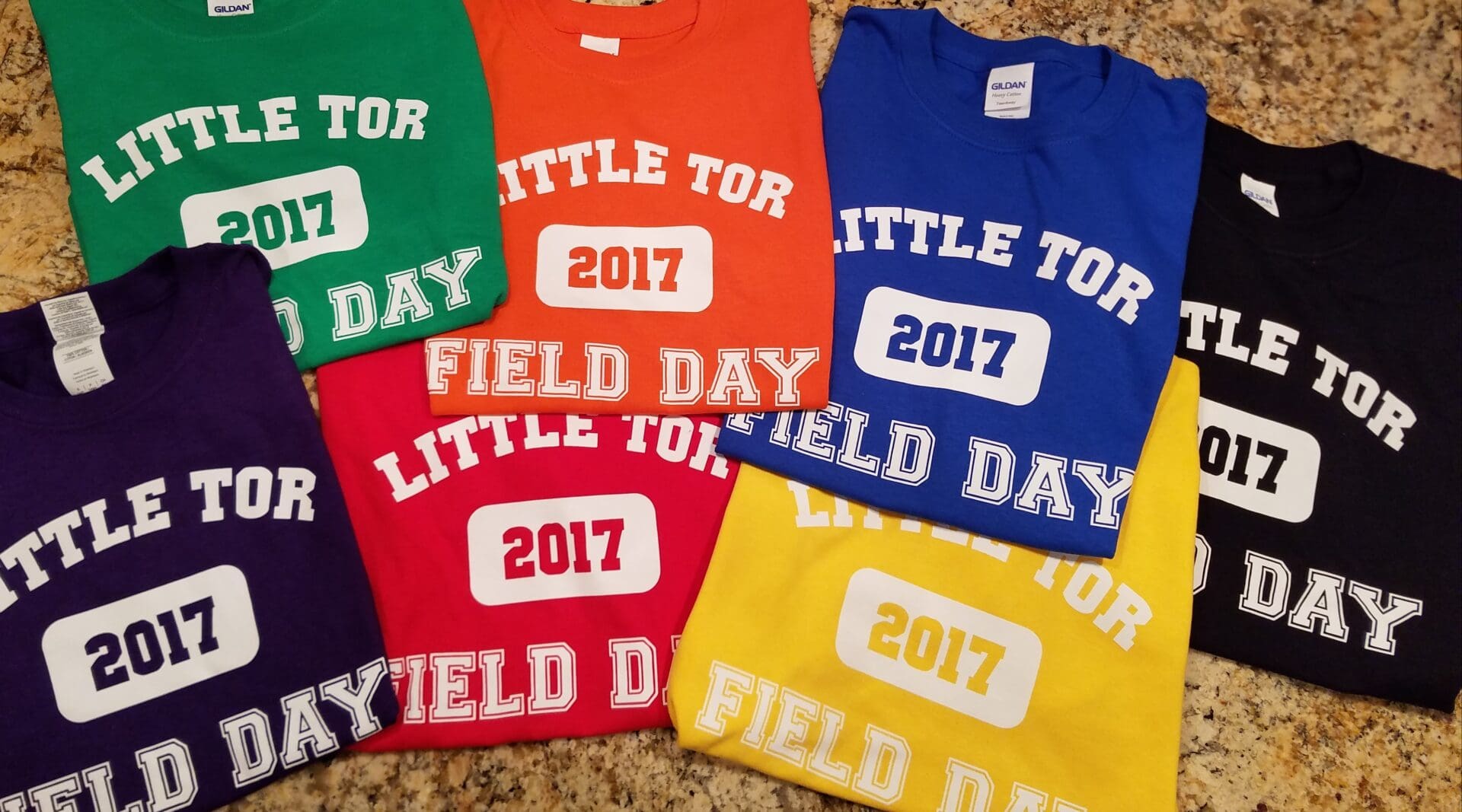 A group of shirts that say little tor field day 2 0 1 7.