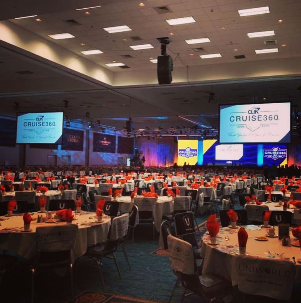 A large room with many tables and chairs