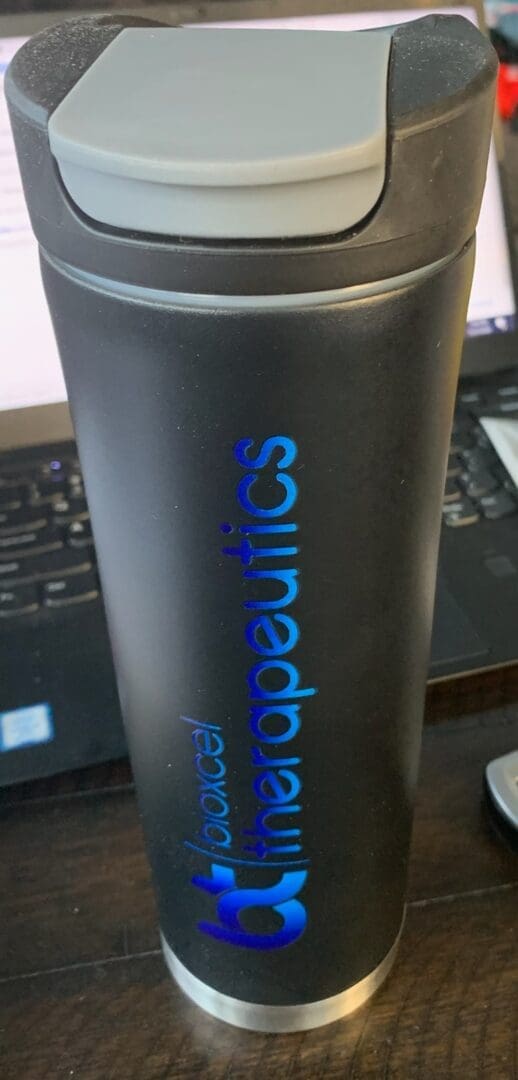 A close up of the side of a thermos