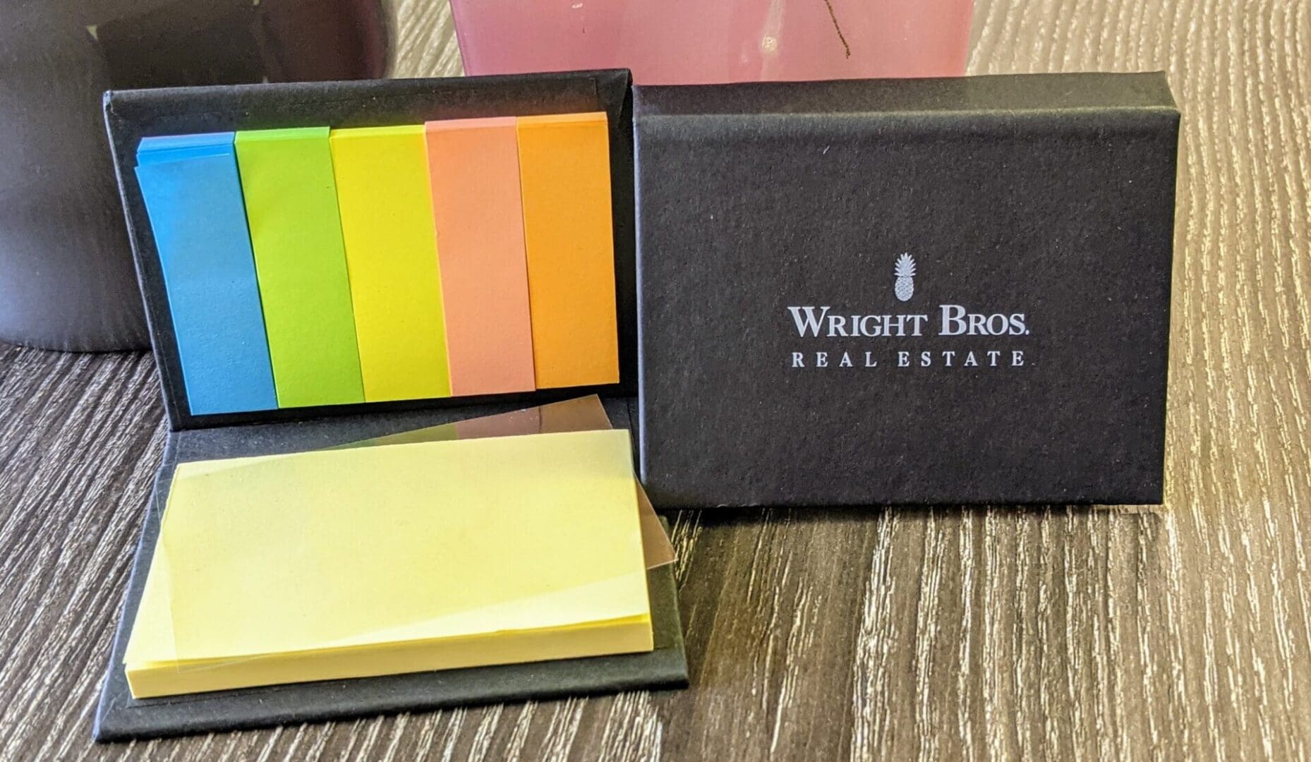 A box of sticky notes with the lid open.